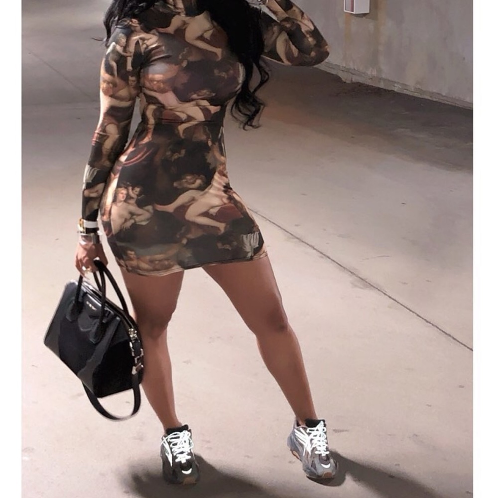 Renaissance long sleeve mini dress.